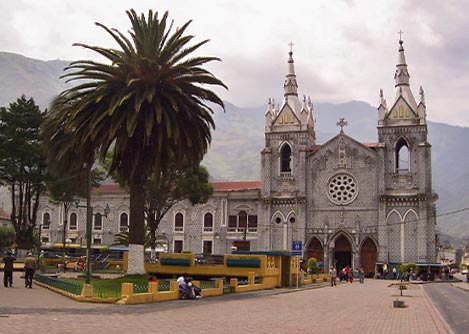 The Church of the Virgin of the Holy Water overlooking the main square of Baños.