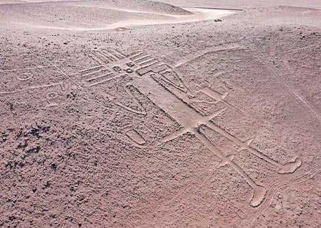 An enormous figure of a man at Cerro Unitas, a large collection of geoglyphs in northern Chile.