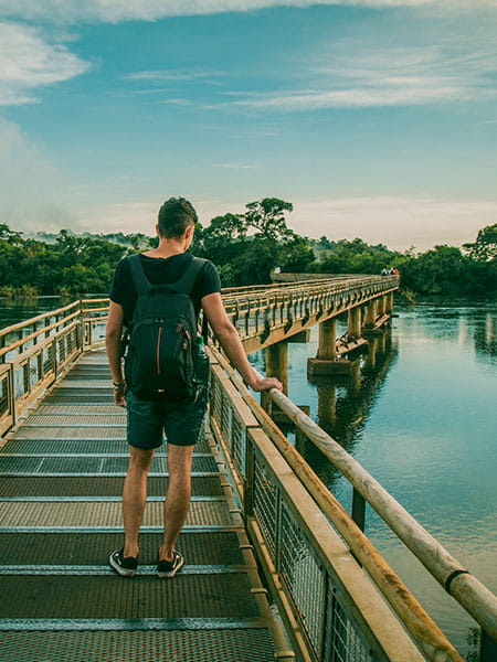 Man overlooking Iguazu's falls