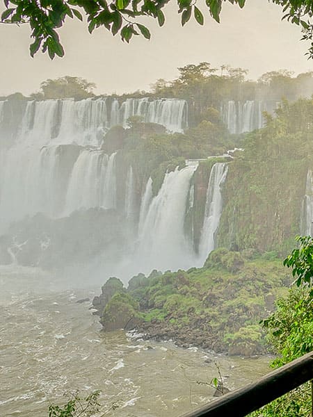 Man overlooking Iguazu's falls