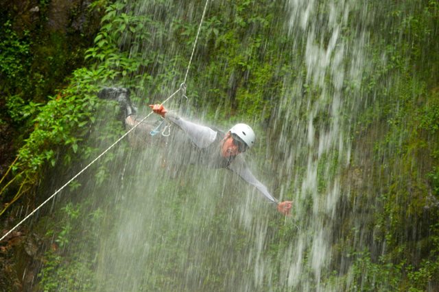 Thrill seeker zipping over El Manto de la Novia in Baños, the adventure capital of Ecuador.