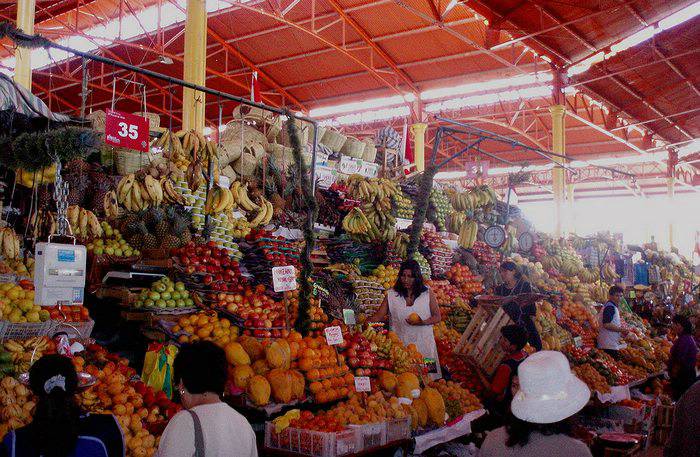 Fresh produce being sold at a market in Peru.