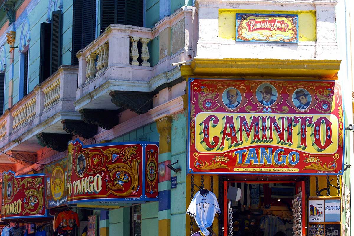 Vibrant signs for the "Caminito Tango" in Buenos Aires, a top South America travel destination.