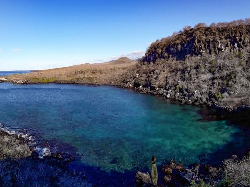 The turquoise bay and sea vistas on the trail to the top of Cerro Tijeretas on San Cristobal Island.