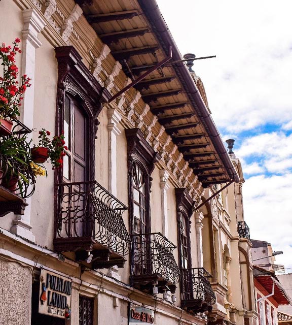 Classic balconies on the second floor of a historic building in the historic center of Cuenca.