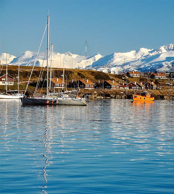 Snow-covered mountains overlooking the port of Ushuaia, the southernmost city in the world.