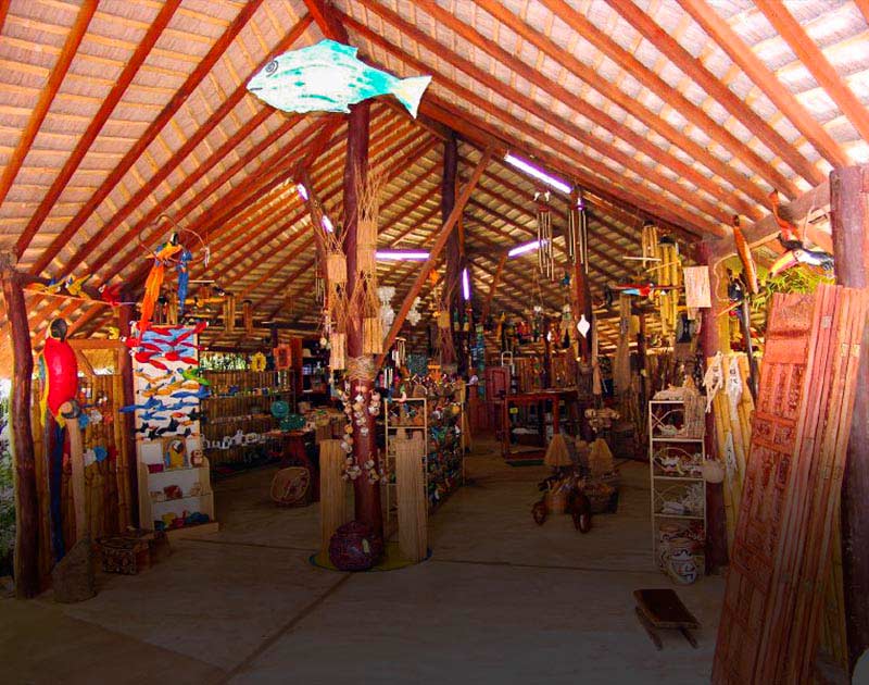 Artisan handicrafts and souvenirs at a small shop inside a rustic building in Bonito.