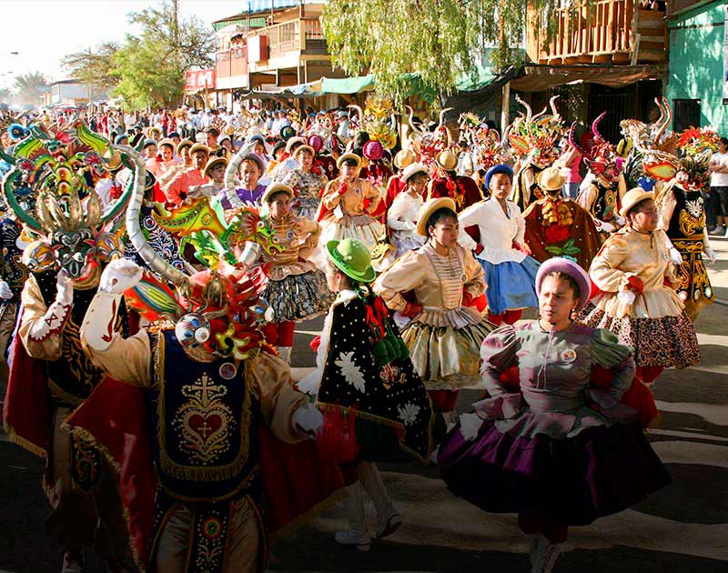 Dancers wearing colorful traditional dress and costumes at the La Tirana Festival in Iquique.