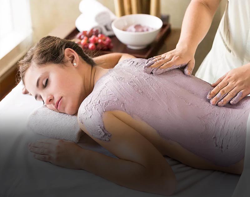 A woman receiving a wellness treatment at the Hotel Park Hyatt, a luxury hotel in Mendoza.