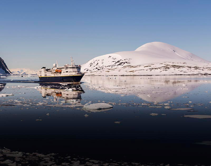 An Antarctic cruise ship making its way through the icy waters off the coast of Punta Arenas.