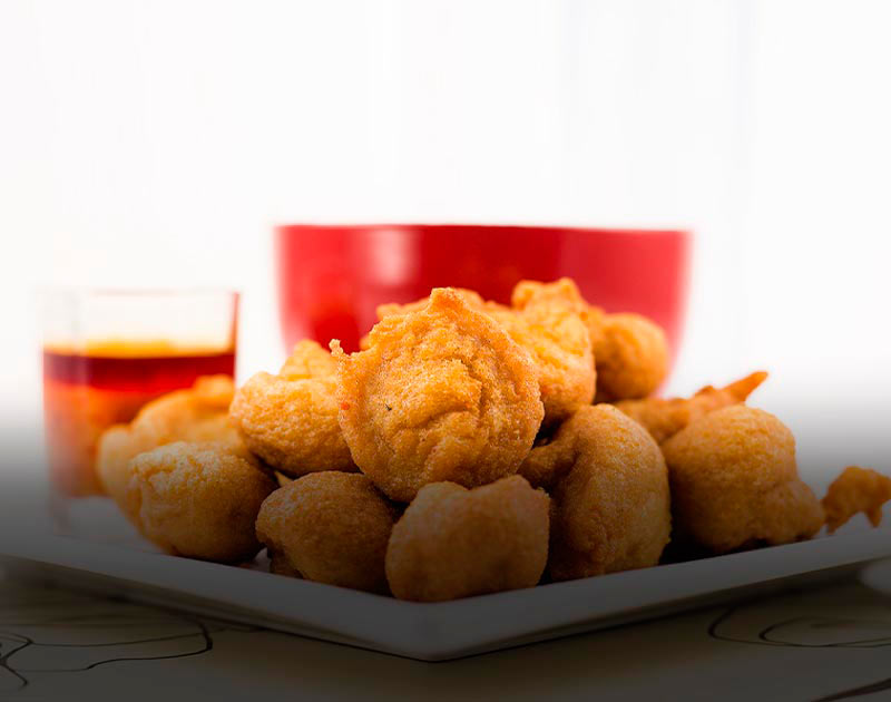 A plate of akara, a typical dish from Salvador consisting of fritters made of black-eyed peas.