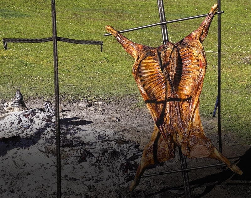 A roasted Patagonian lamb, one of the delicacies from the area that can be enjoyed in Ushuaia.