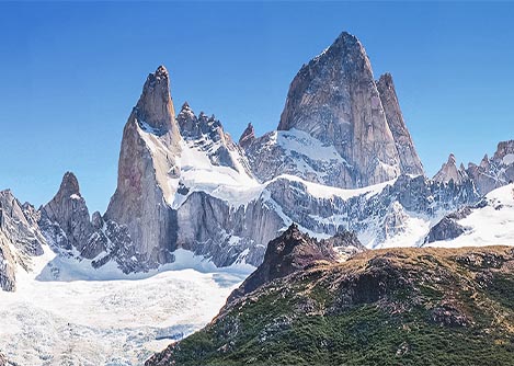 The jagged peaks of Mount Fitz Roy, surrounded by ice and snow