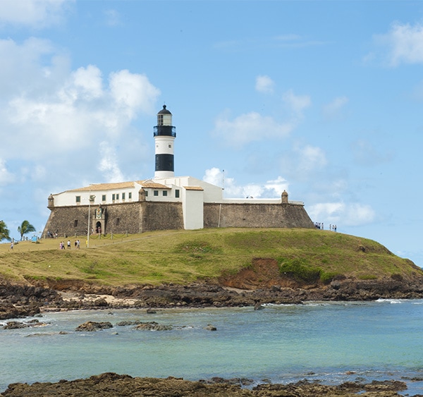 Farrol da Barra, a historic lighthouse dating to the 17th century located in Salvador de Bahia.