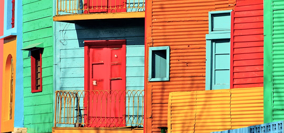 Colorful painted buildings in the traditional alley known as Caminito in Buenos Aires.
