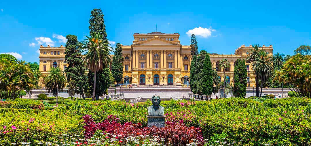 A bust of a man in a garden in front of the Paulista Museum in Sao Paulo’s Independence Park.