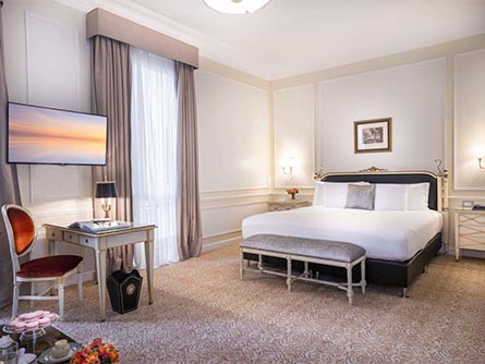 A room featuring classic carpeting and furniture at the Alvear Palace Hotel in Buenos Aires.