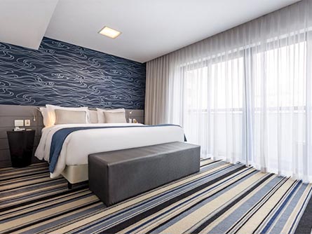 A modern room featuring a blue and white motif at the Radisson Hotel Oscar Freire in Sao Paulo.