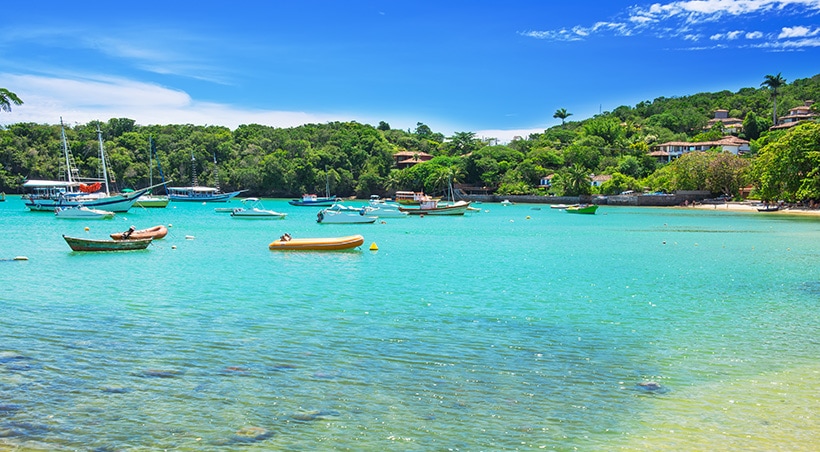 Boats in the water off the shore of Buzios, a popular beach resort town near Rio de Janeiro.