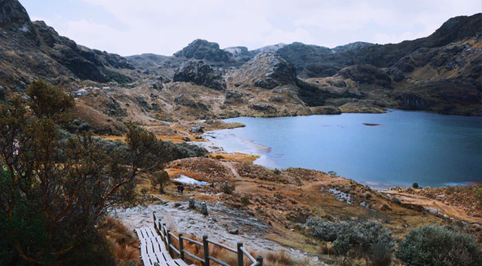 A lake surrounded by Andean scenery and native flora in El Cajas National Park near Cuenca.