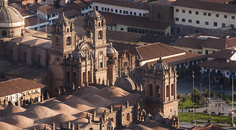 Aerial view of the Cusco Cathedral and other colonial buildings in Cusco's plaza de armas.