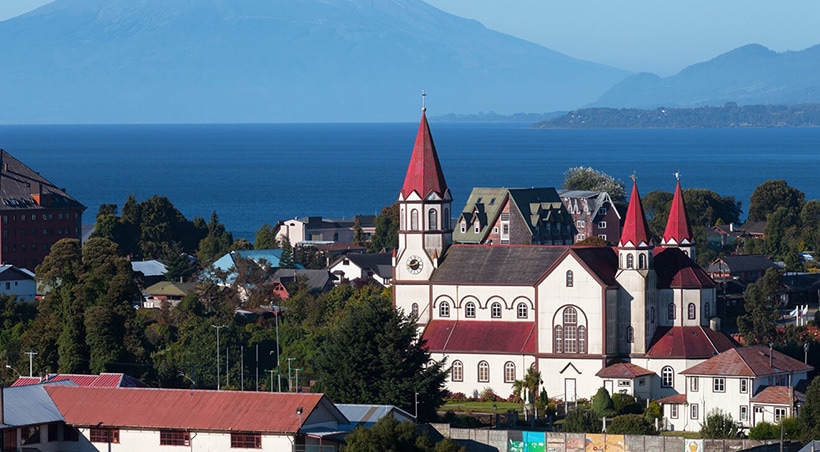 A traditional church towers over the town of Puerto Varas on the shores of Lake Llanquihue.