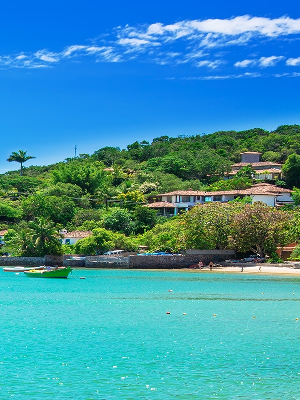 Boats in the water off the shore of Buzios, a popular beach resort town near Rio de Janeiro.