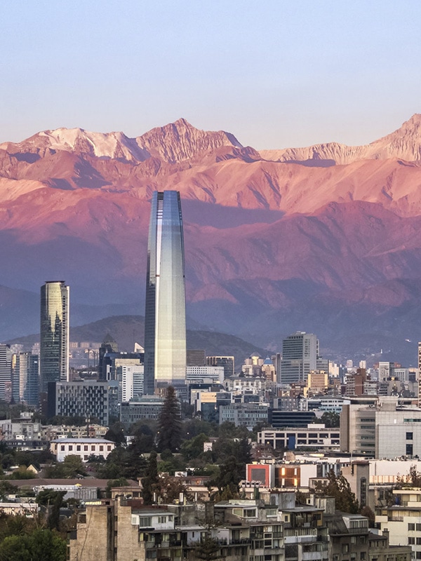 View of the city of Santiago, with the snow-capped Andes Mountains towering overhead.