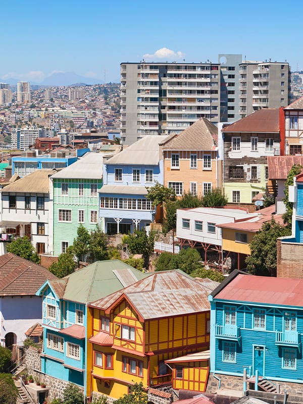 Colorful traditional houses and modern buildings in the Chilean port of Valparaíso.