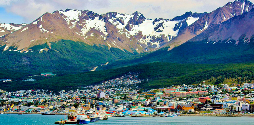 snowy mountains overlooking the city of ushuaia