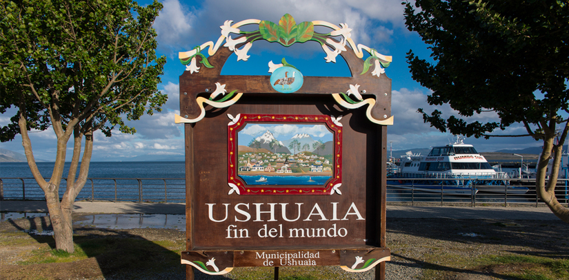 A sign reading - Ushuaia - End of the world