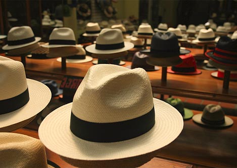 Panama hats on display at a shop in Cuenca, one of the best places to buy this iconic hat.